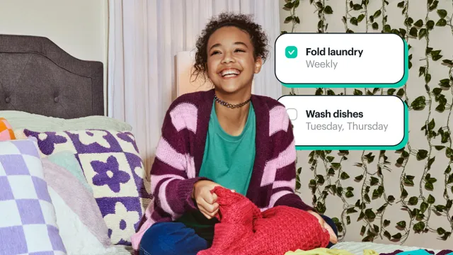 Teenage girl sitting on her bed and folding clothes with two graphics overlayed saying, "Fold laundry weekly" and "Wash dishes Tuesday, Thursday"