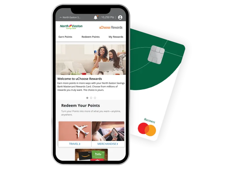 Phone displaying a uChoose Rewards screen with a business debit card in the background