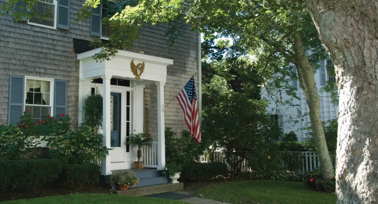 Front stoop and exterior a grey suburban house